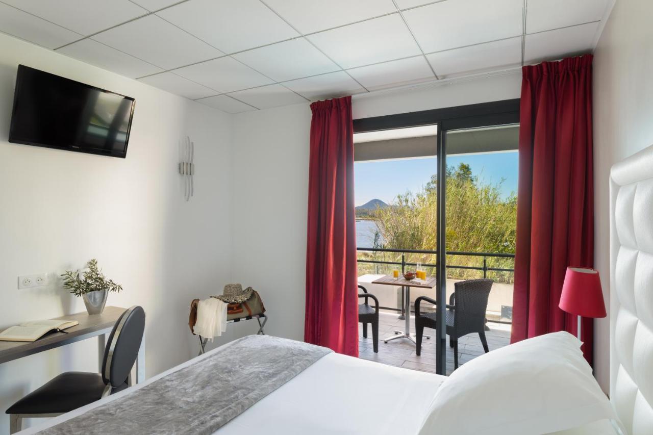Les Roches Blanches Hotel ปอร์โต-เวคคีโอ ภายนอก รูปภาพ